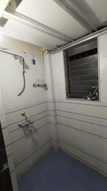 Bathroom in 1 BHK Apartment at Royal Palms, Goregaon East – for Rent
