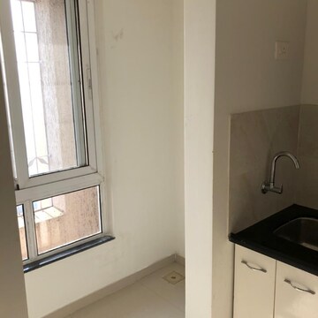 Kitchen in 2 BHK Apartment at Raymond Ten X Habitat, Swastik Garden – for Rent