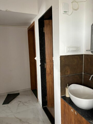Bathroom in 2 BHK Apartment at Satyam Serenity, Wadgaon Sheri – for Rent