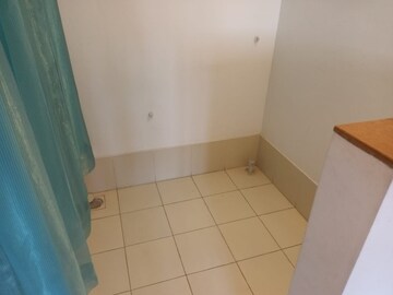 Bathroom in 2 BHK Apartment at Kumar Palmspring Towers, Undri – for Sale