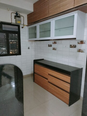 Kitchen in 2 BHK Apartment at Riverdale Tower, Andheri East – for Rent