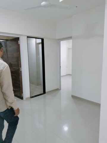 Building Lobby in 2 BHK Apartment at Riverdale Tower, Andheri East – for Rent