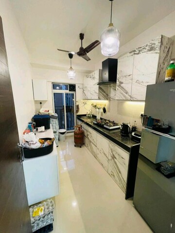 Kitchen in 2 BHK Apartment at Bini Winspace Amelio, Andheri West – for Rent