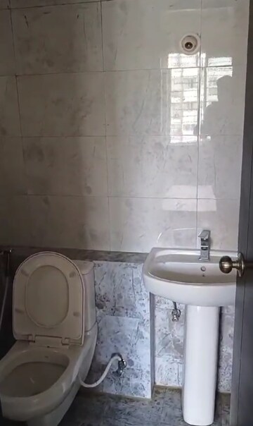 Bathroom in 3 BHK Apartment at RR Signature, Thanisandra Main Road – for Rent