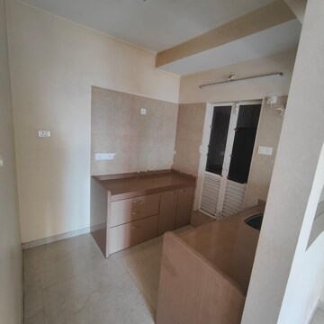 Kitchen in 2 BHK Apartment at Dosti West County, Balkum Pada – for Rent