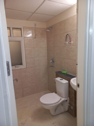 Bathroom in 2 BHK Apartment at Wave Executive Floors, Wave City – for Rent