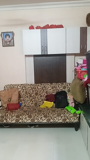 Living Room in 1 BHK Apartment at Poonam Enclave, Goregaon East – for Rent