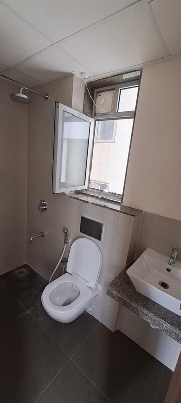 Bathroom in 2 BHK Apartment at Piramal Vaikunth, Balkum Pada – for Rent