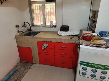 Kitchen in 2 BHK Apartment at Shantinagar CHS, Mira Road – for Rent