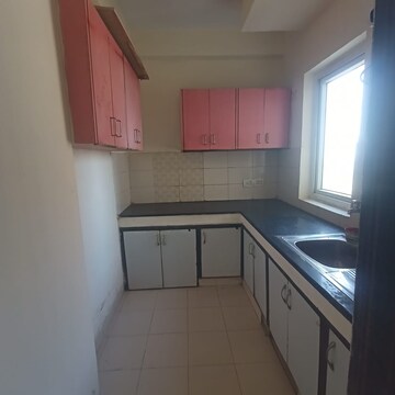 Kitchen in 2 BHK Apartment at Nimbus Express Park View, Chi V Greater Noida – for Rent