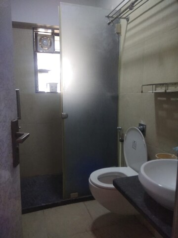 Bathroom in 3 BHK Apartment at Cosmopolis Tower, Andheri West – for Rent