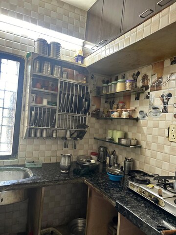 Kitchen in 2 BHK Apartment at Saket Nagar – for Sale