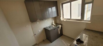 Kitchen in 2 BHK Apartment at Piramal Vaikunth, Balkum Pada – for Rent