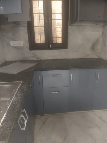 Kitchen in 2 BHK Apartment at Ramesh Nagar – for Rent