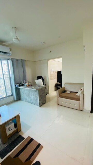 Living Room in 1 BHK Apartment at Bindra Complex, Andheri East – for Rent
