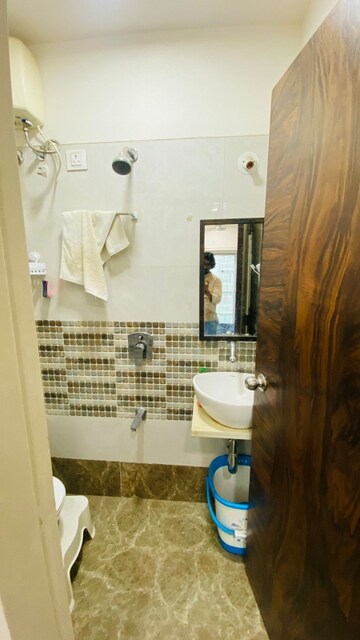 Bathroom in 1 BHK Apartment at Bindra Complex, Andheri East – for Rent