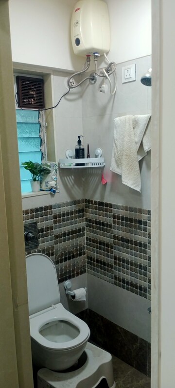 Bathroom in 1 BHK Apartment at Bindra Complex, Andheri East – for Rent