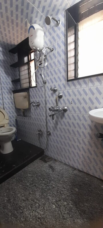 Bathroom in 1 BHK Apartment at Royal Palms, Goregaon East – for Rent