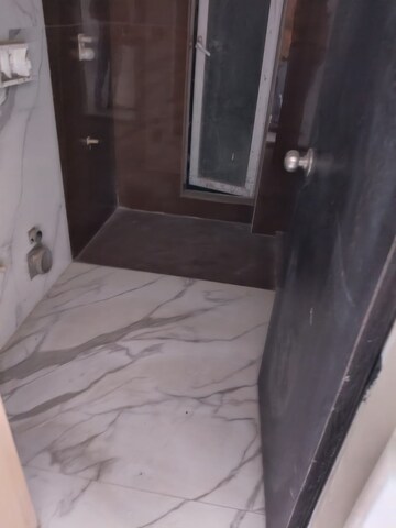 Bathroom in 2 BHK Apartment at RNA NG Eclat, Andheri West – for Sale