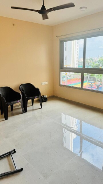 Living Room in 2 BHK Apartment at Piramal Vaikunth Vidit, Balkum Pada – for Rent