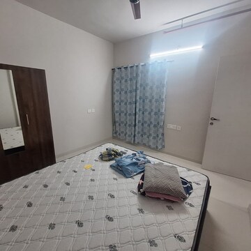 Bedroom in 2 BHK Apartment at Rustomjee Urbania, Saket Complex – for Rent