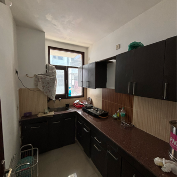 Kitchen in 2 BHK Apartment at Dhakoli Village – for Sale