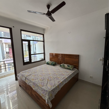 Bedroom in 2 BHK Apartment at Dhakoli Village – for Sale