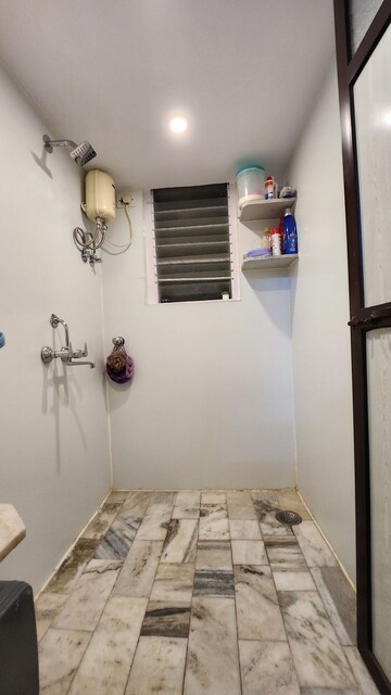 Bathroom in 3 BHK Apartment at Oberoi Maxima, Andheri East – for Rent