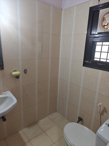 Bathroom in 2 BHK Apartment at Unnati Fortune The Aranya, Sector 119 – for Rent