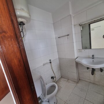Bathroom in 1 BHK Apartment at Omaxe NRI City Apartments, Omega Ii Greater Noida – for Rent