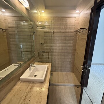 Bathroom in 4 BHK Builder Floor at Green Park Extension – for Sale