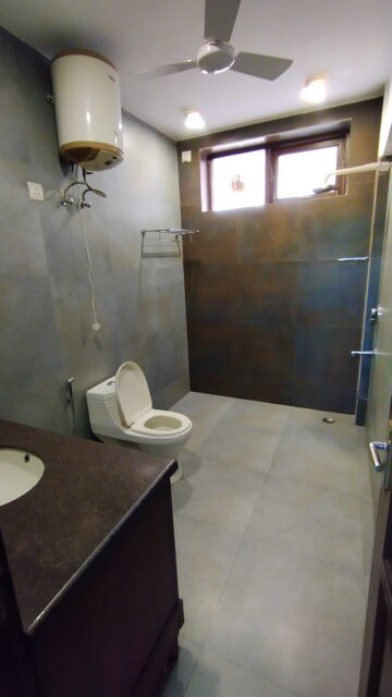 Bathroom in 3 BHK Apartment at Panchsheel Vihar – for Sale