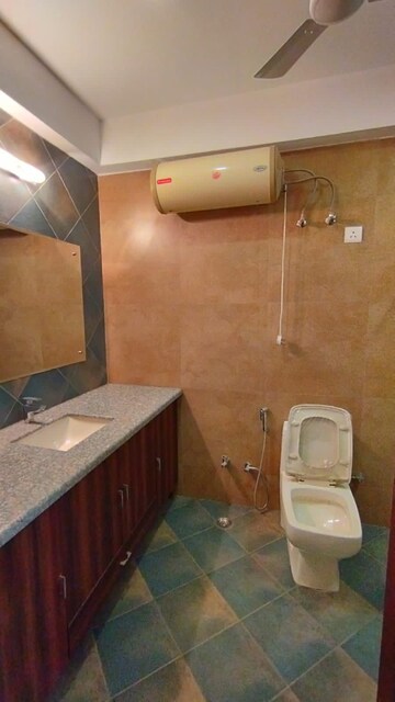Bathroom in 3 BHK Apartment at Panchsheel Vihar – for Sale