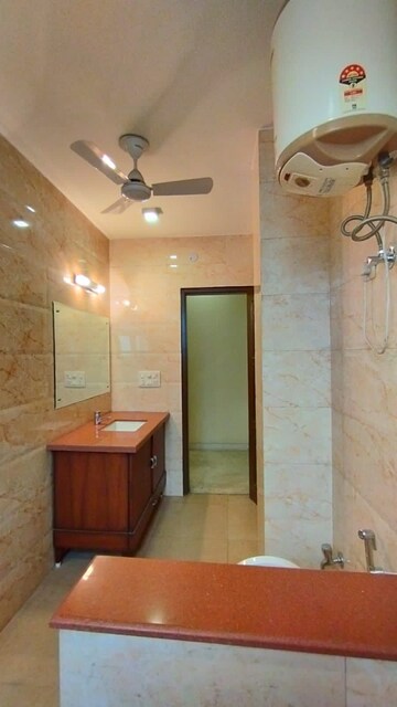 Bathroom in 3 BHK Apartment at Panchsheel Vihar – for Sale