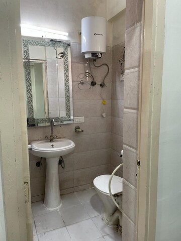 Bathroom in 1 BHK Apartment at Sikka Karmic Greens, Sector 78 – for Rent