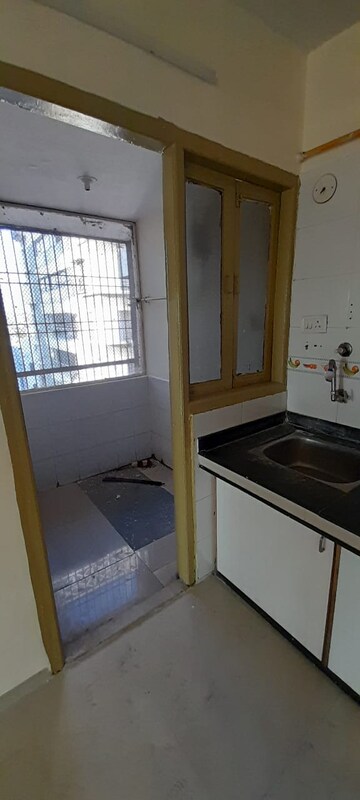 Kitchen in 3 BHK Apartment at Vip Road Vesu – for Sale