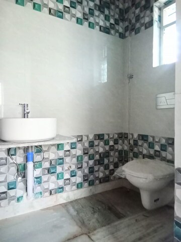 Bathroom in 3 BHK Builder Floor at Em Bypass – for Sale