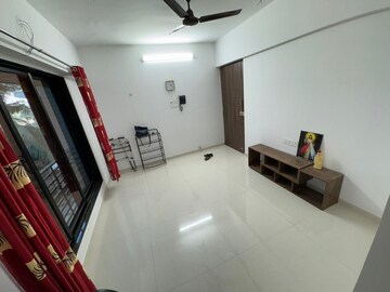 Living Room in 1 BHK Apartment at PCPL Tiara CHS, Malad West – for Rent
