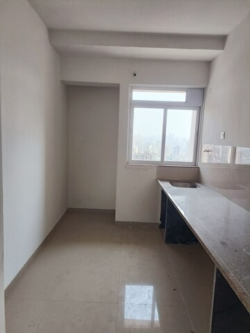 Kitchen in 1 BHK Apartment at Puraniks City Reserva, Ghodbunder Road – for Sale