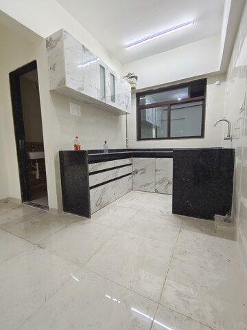 Kitchen in 2 BHK Apartment at Prime CHS, Mulund East – for Rent