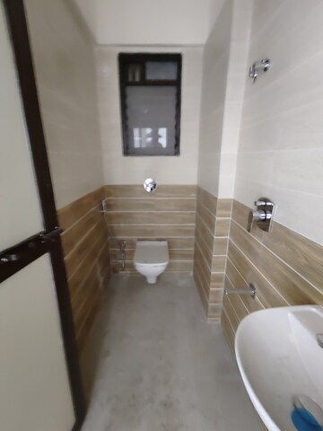 Bathroom in 2 BHK Apartment at Prime CHS, Mulund East – for Rent