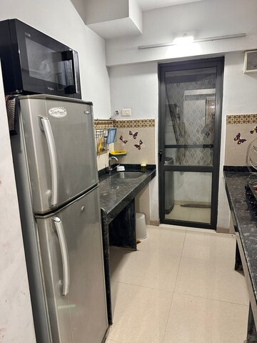 Kitchen in 1 BHK Apartment at Lodha Palava City Lakeshore Greens, Dombivli East – for Rent