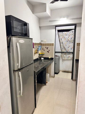 Kitchen in 1 BHK Apartment at Lodha Palava City Lakeshore Greens, Dombivli East – for Rent