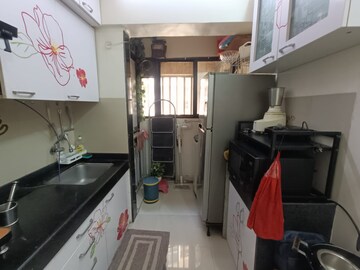Kitchen in 1 BHK Apartment at Abhay Sheetal  Complex, Mira Road – for Sale