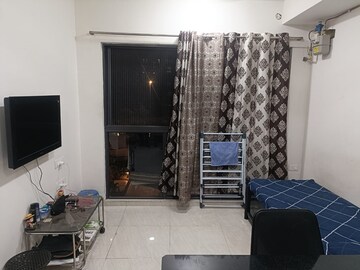 Living Room in 1 BHK Apartment at Lodha Crown Quality Homes, Majiwada – for Rent
