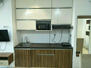 Kitchen in 1 RK Apartment at Supertech North Eye, Sector 74 – for Rent