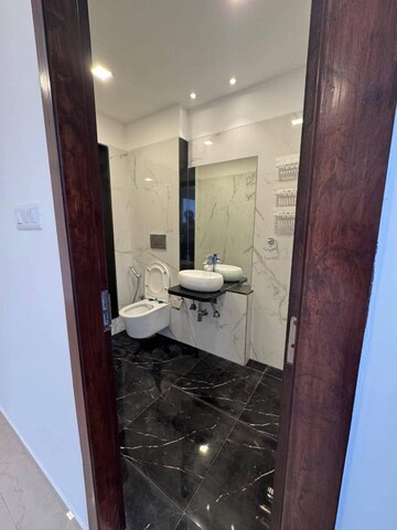 Bathroom in 2 BHK Apartment at Ruparel Ariana, Parel – for Rent