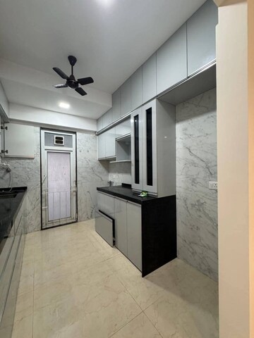 Kitchen in 2 BHK Apartment at Ruparel Ariana, Parel – for Rent