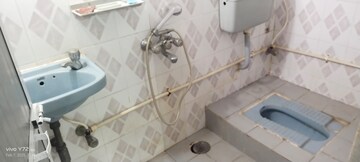 Bathroom in 1 BHK Apartment at Riddhi Garden, Malad East – for Rent