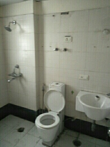 Bathroom in 2 BHK Apartment at Aims Golf City, Sector 75 – for Rent